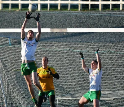 Peter catching a high ball playing for Carrickmacross Emmets