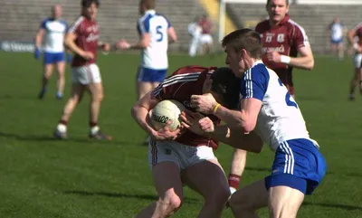 Peter tackling a Galway player in the Monaghan jersey